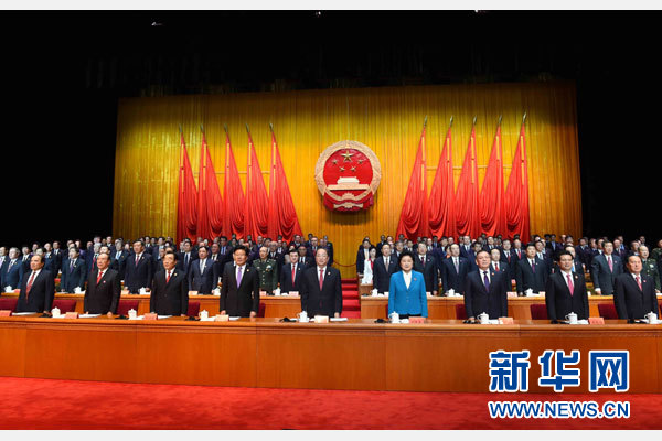 10月1日，慶祝中華人民共和國成立66周年暨新疆維吾爾自治區成立60周年大會在新疆人民會堂隆重舉行。 新華社記者 饒愛民 攝