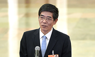 中國殘疾人聯合會執行理事會理事長魯勇接受采訪
